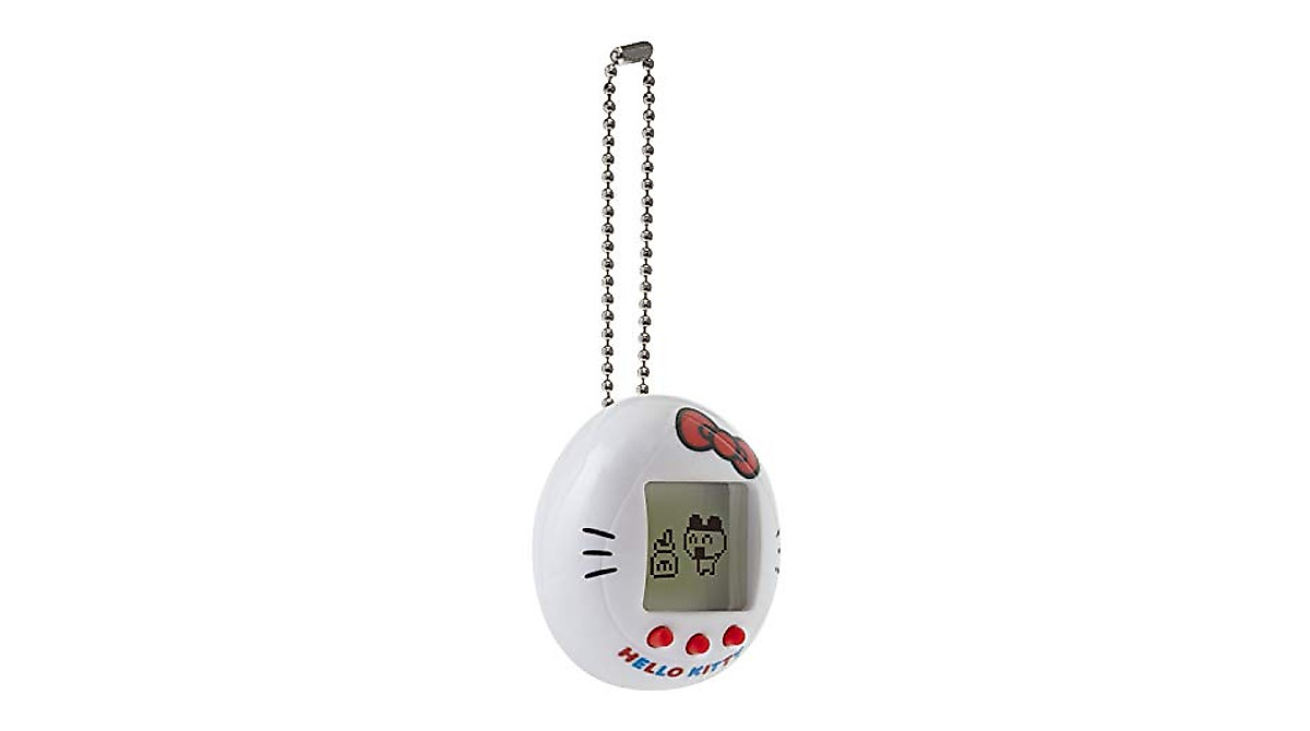 Tamagotchi Hello Kitty – Mascota Electrónica Con Mini Juegos, Cadena Incluida, Pilas LR44 Incluidas, Para Niños De 8 Años En Adelante, Edición Especial Blanca Con Lazo Rojo